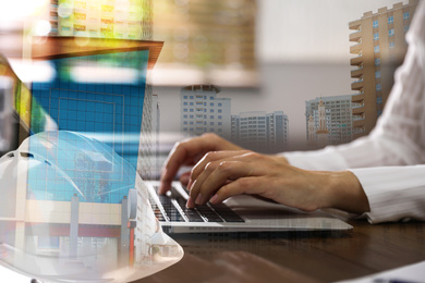 Image of Engineer working with laptop at table in office and modern buildings, closeup. Multiple exposure