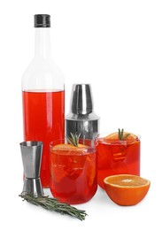 Aperol spritz cocktail with orange slices, rosemary and shaker isolated on white