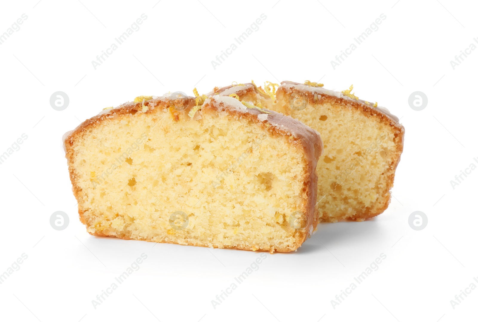 Photo of Pieces of tasty lemon cake with glaze isolated on white