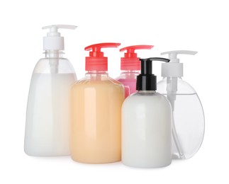 Dispensers of liquid soap on white background