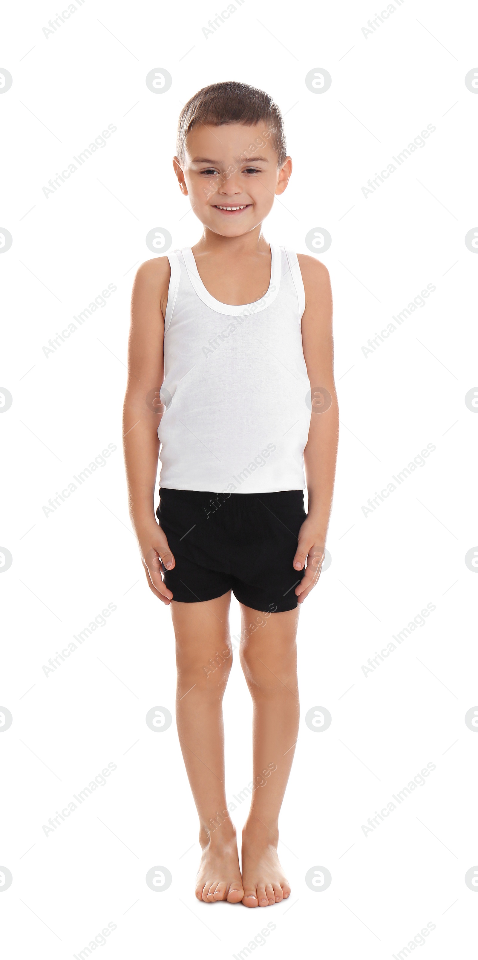 Photo of Cute little boy in underwear on white background