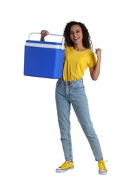 Happy young African American woman with cool box on white background