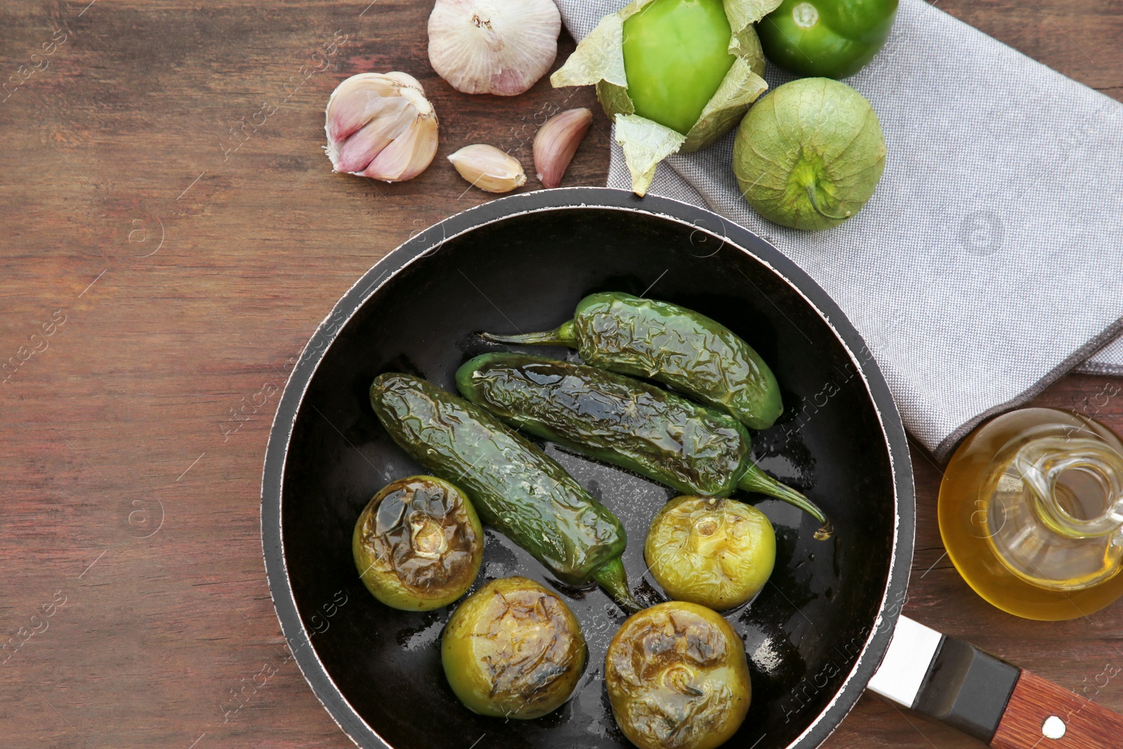 Photo of Different ingredients for cooking tasty salsa sauce on wooden table, flat lay