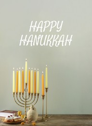 Image of Happy Hanukkah. Menorah, donuts and dreidels on wooden table