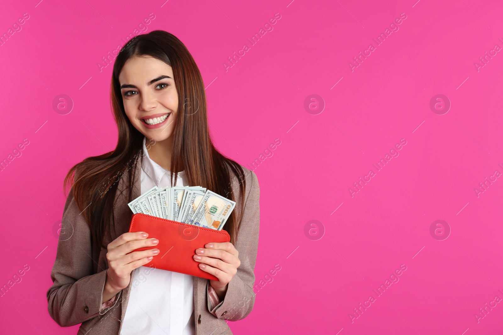 Photo of Businesswoman with money in wallet on color background. Space for text