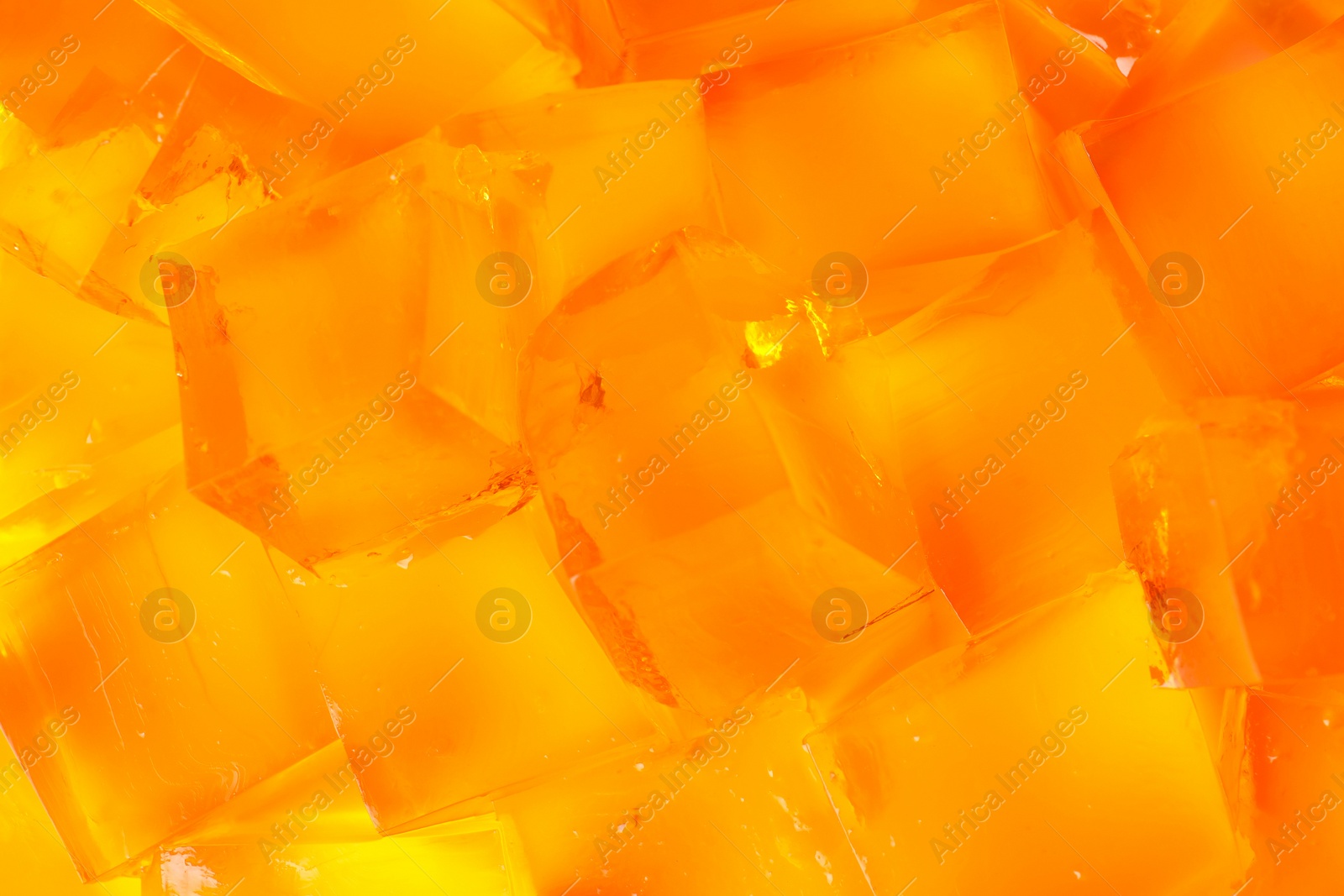 Photo of Tasty natural jelly cubes as background, closeup