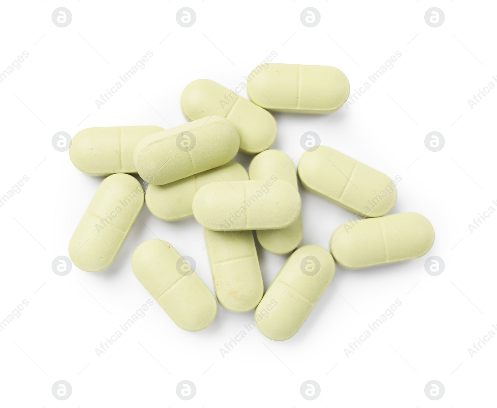 Photo of Vitamin pills isolated on white, top view