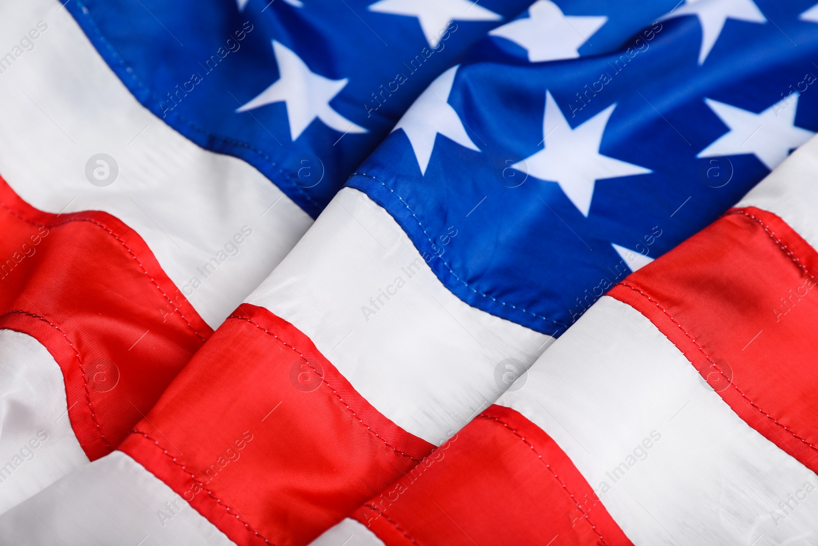 Photo of American flag as background, closeup. National symbol of USA