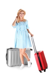 Photo of Woman with suitcases on white background. Vacation travel