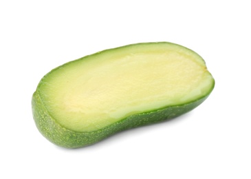 Cut fresh seedless avocado isolated on white