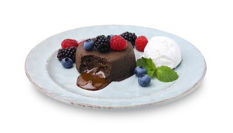 Photo of Delicious chocolate fondant served with fresh berries and ice cream isolated on white