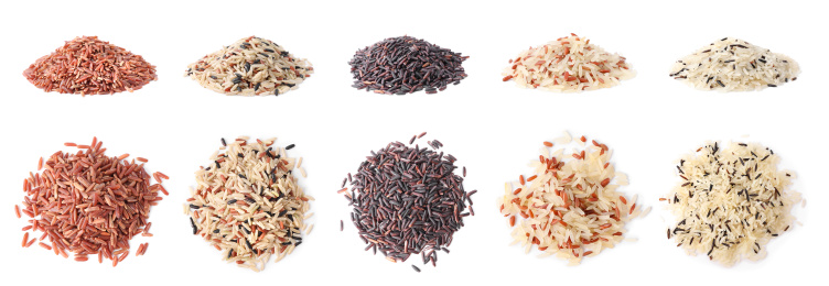 Image of Set with different types of rice on white background. Banner design