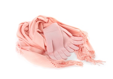 Photo of Stylish gloves and scarf on white background. Autumn clothes