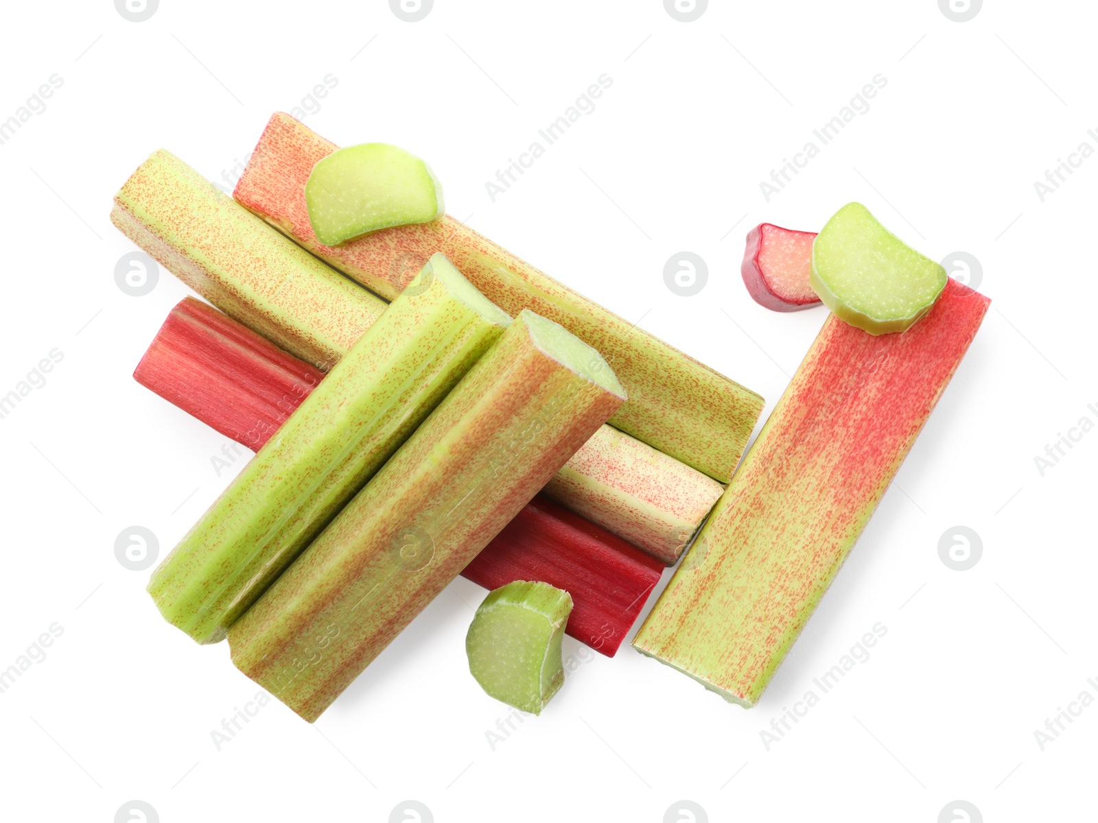 Photo of Cut fresh ripe rhubarb isolated on white, top view