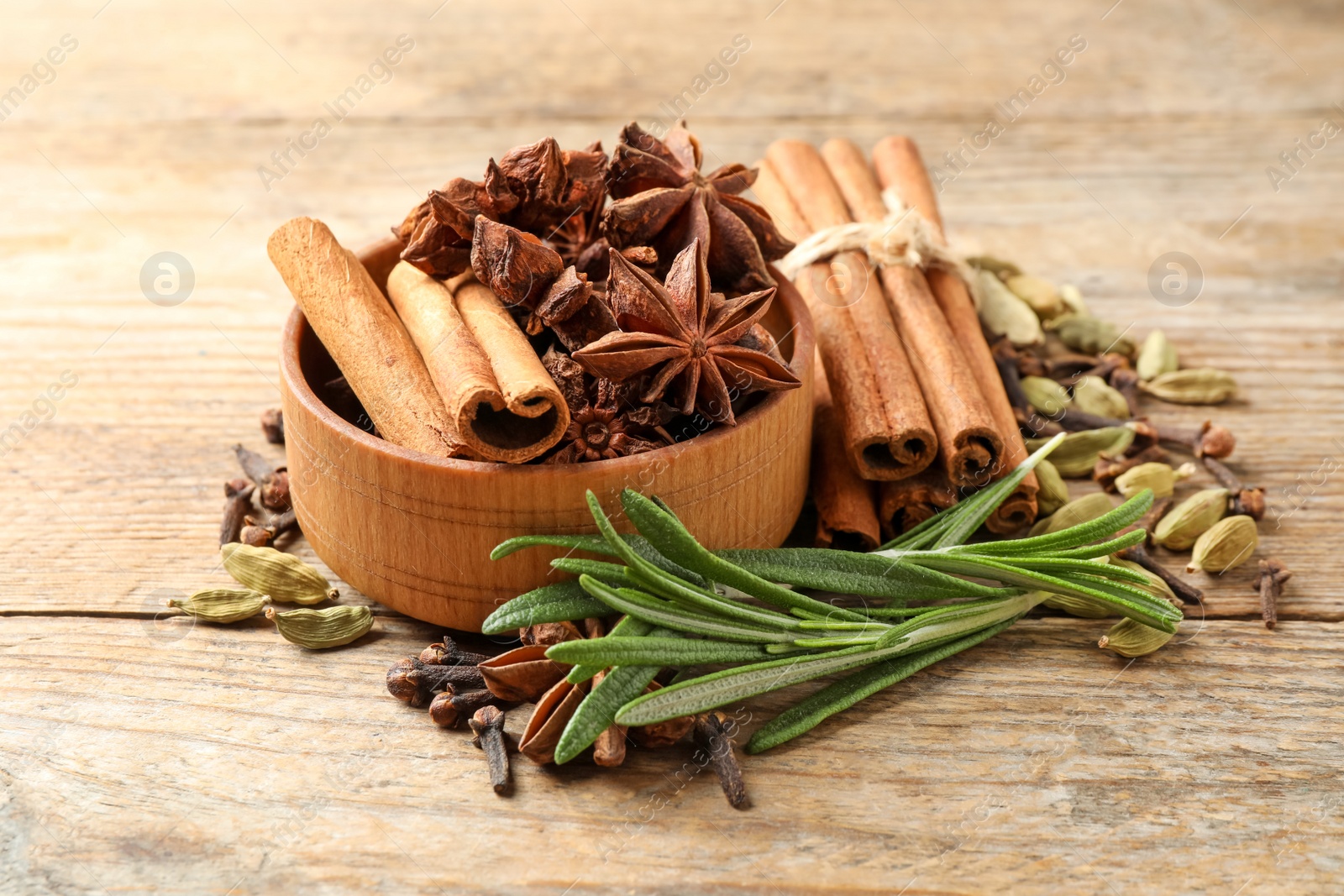 Photo of Composition with mulled wine ingredients on wooden table