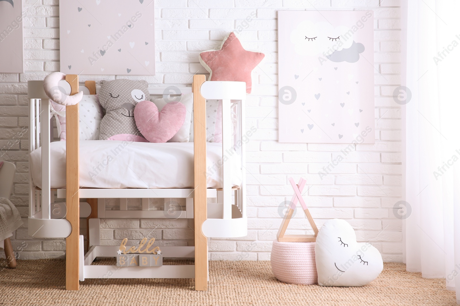 Photo of Baby room interior with toys and stylish furniture