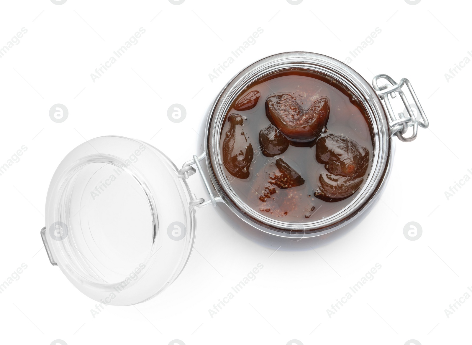 Photo of Jar of tasty sweet fig jam isolated on white