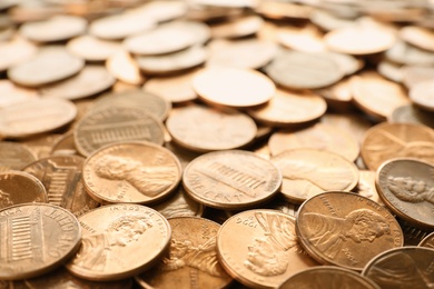 Pile of shiny USA one cent coins as background