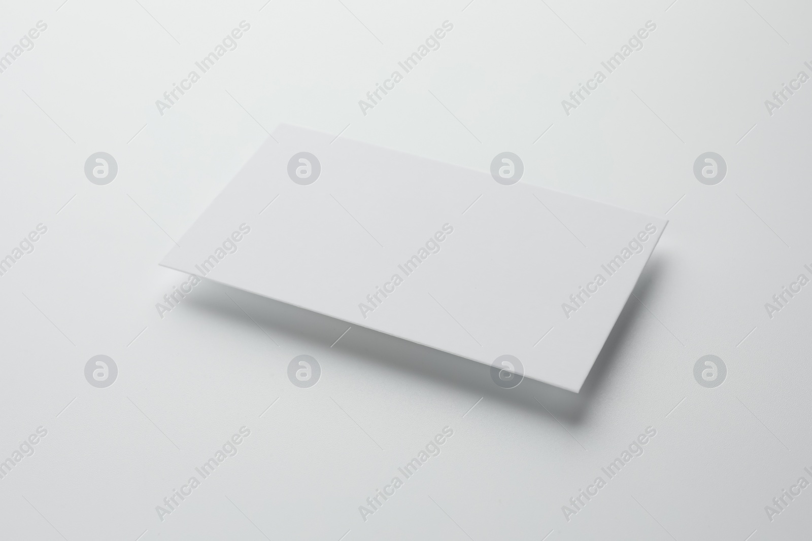 Photo of Blank business card on white background. Mockup for design