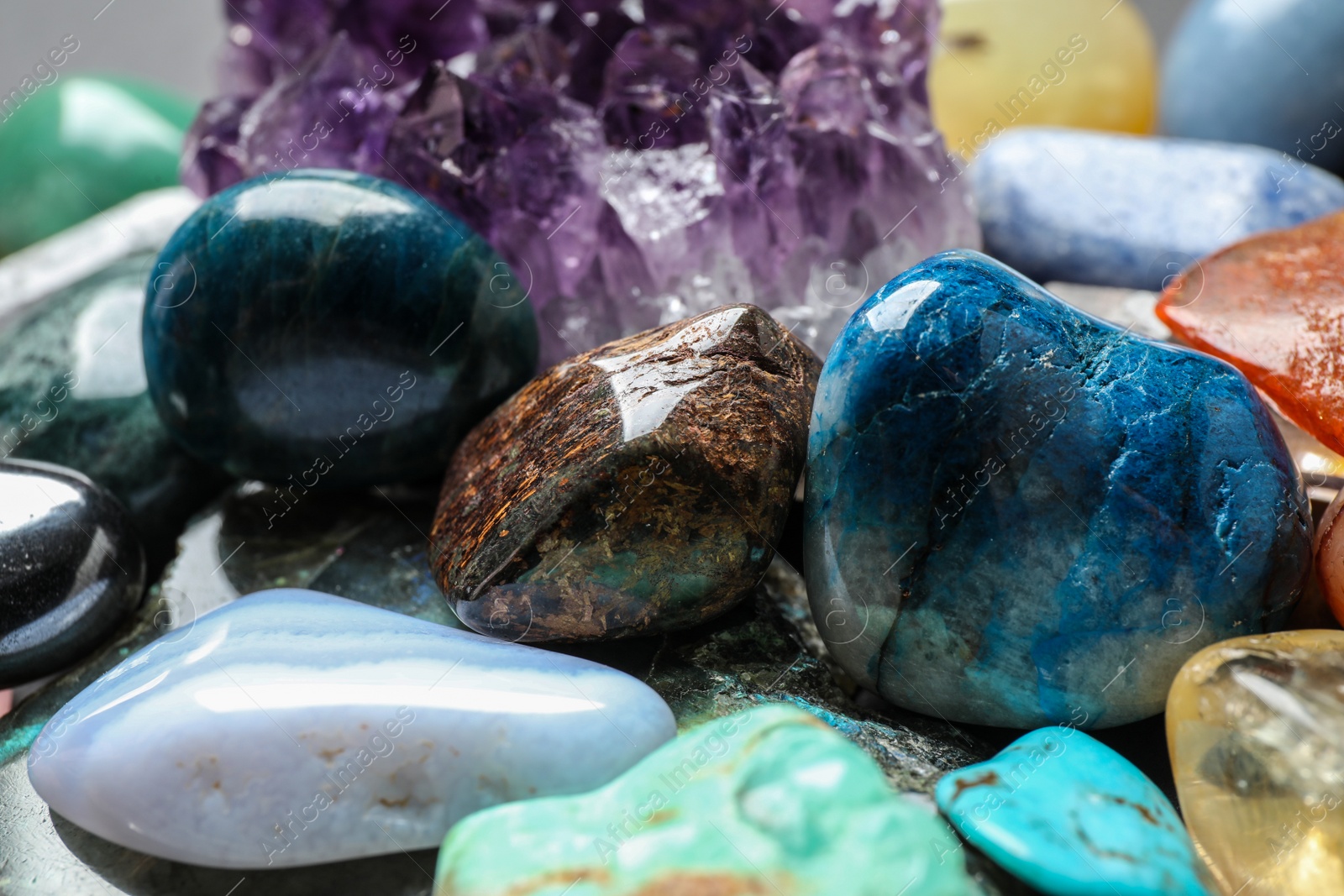 Photo of Different precious gemstones as background, closeup view