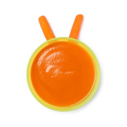 Photo of Delicious baby food in bowl and fresh carrots isolated on white, top view