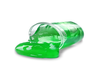 Photo of Overturned plastic container with green slime isolated on white. Antistress toy