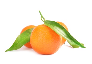 Tasty ripe tangerines with leaves on white background