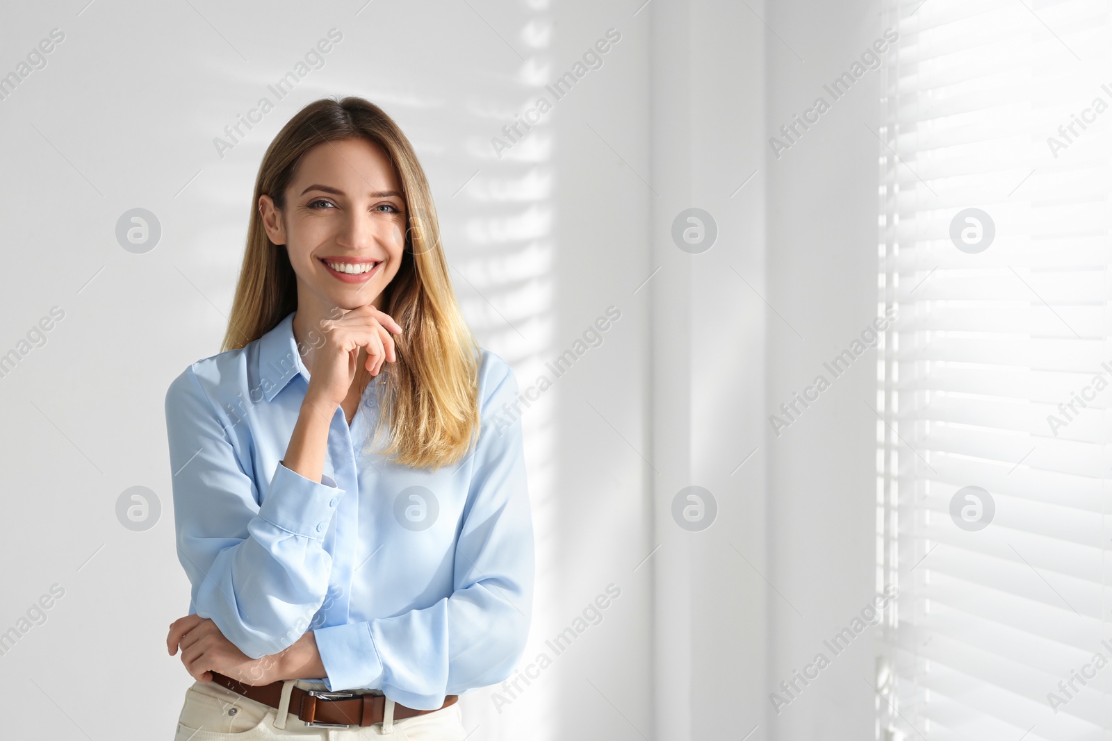 Photo of Portrait of beautiful young businesswoman in office