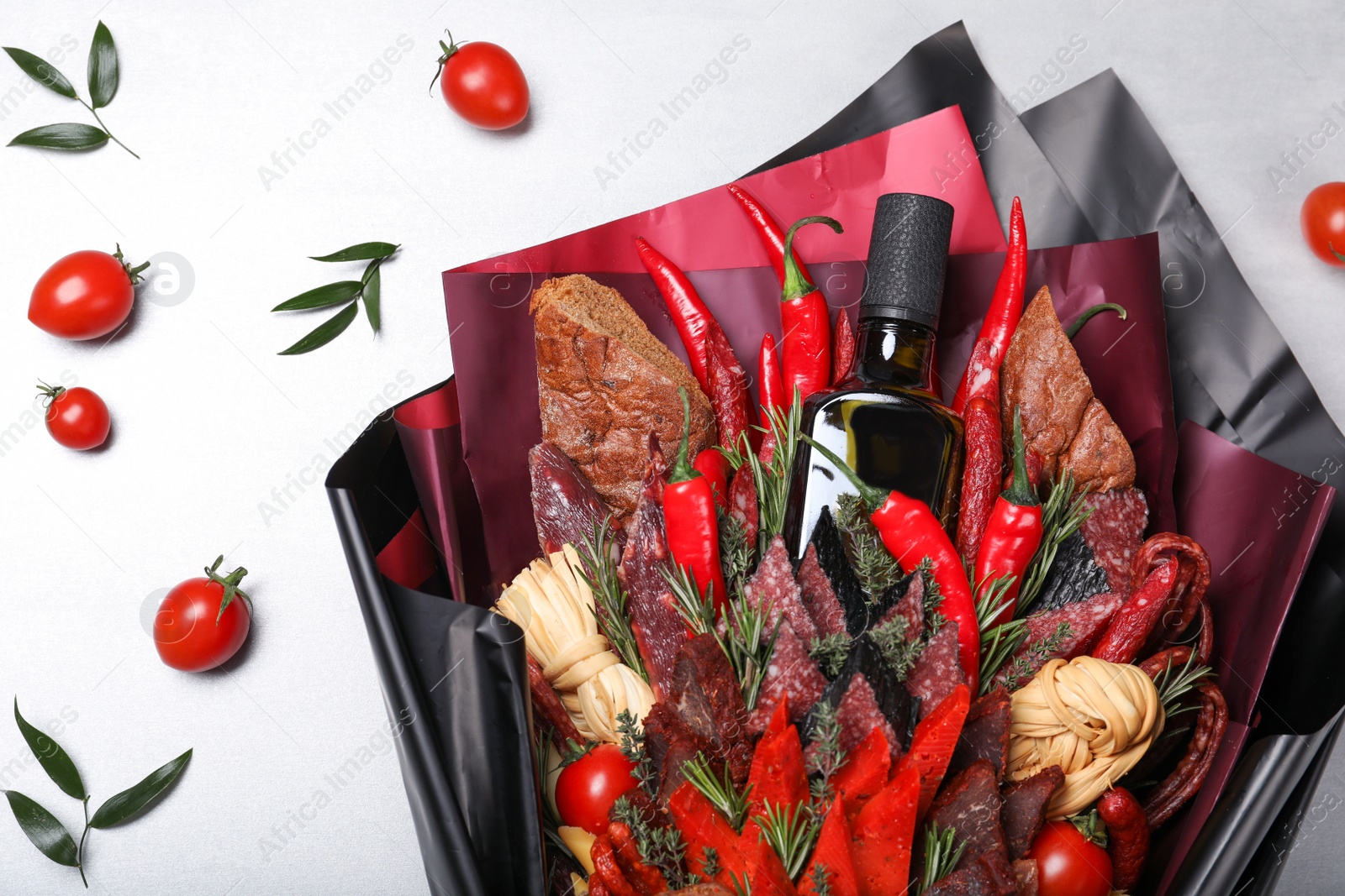 Photo of Beautiful food bouquet on light background, flat lay