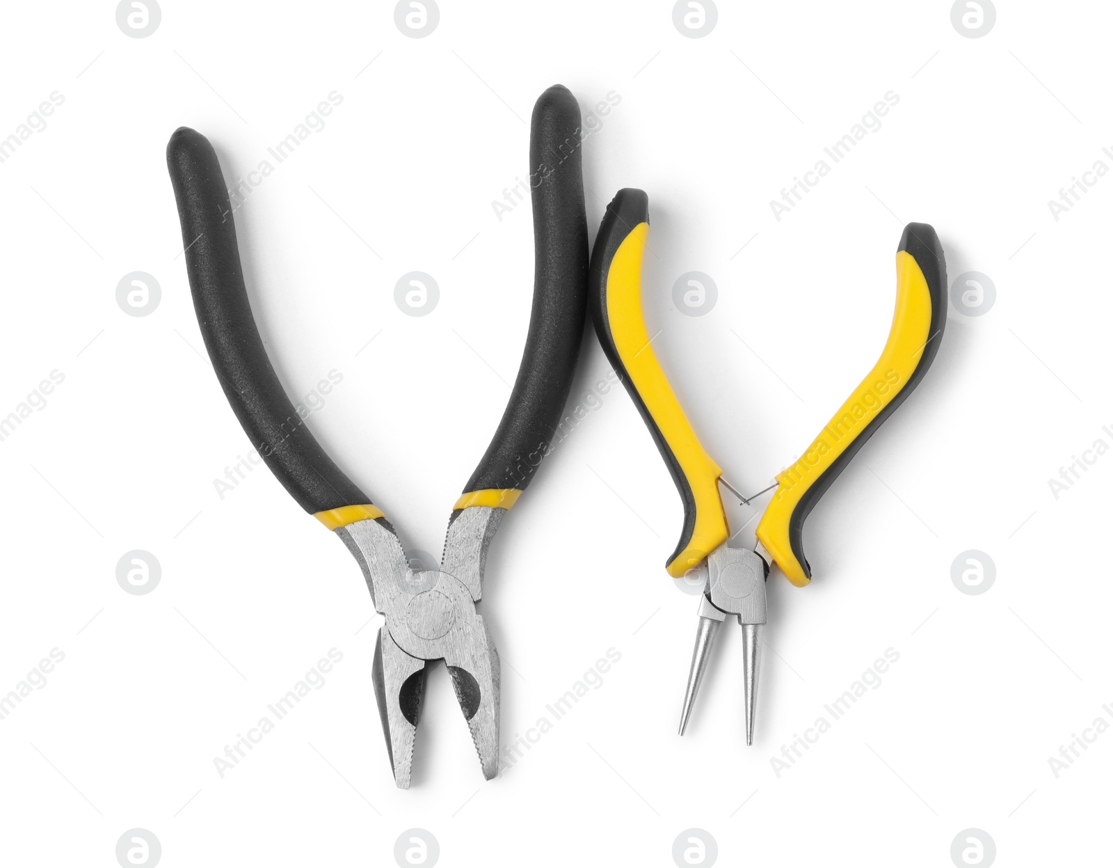 Photo of Different pliers isolated on white, top view