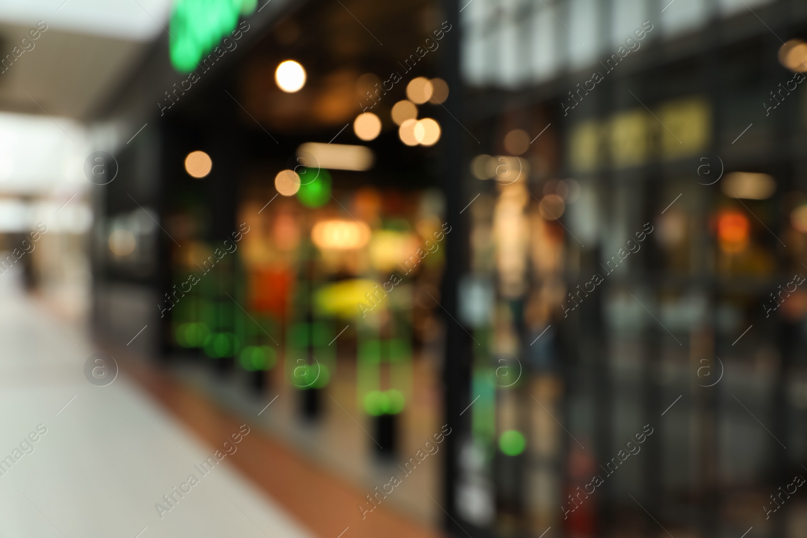 Photo of Blurred view of shopping mall interior. Bokeh effect