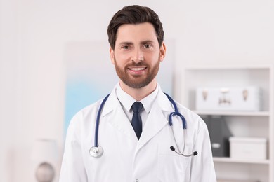 Portrait of medical consultant with stethoscope in clinic