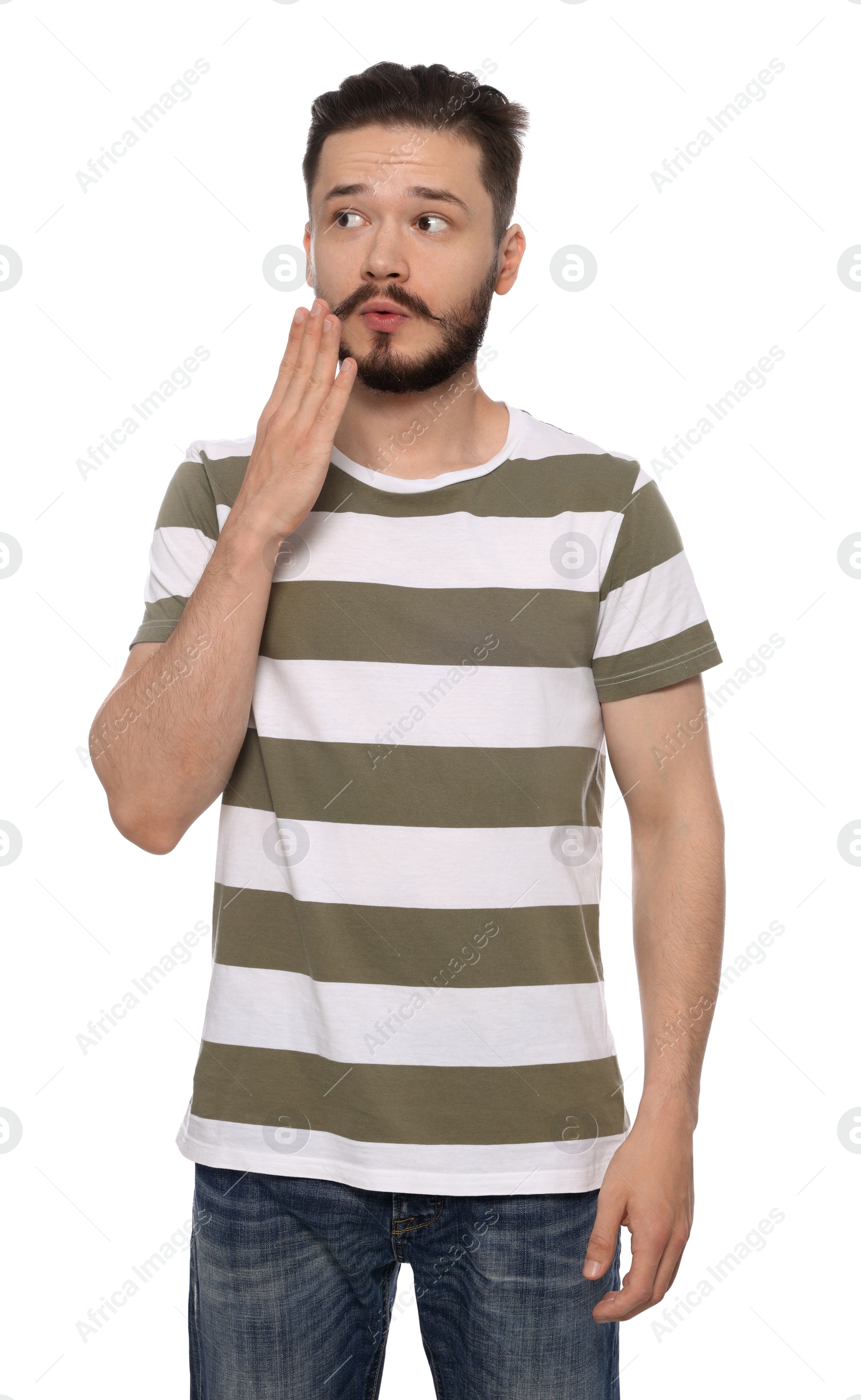 Photo of Embarrassed man covering mouth with hand on white background