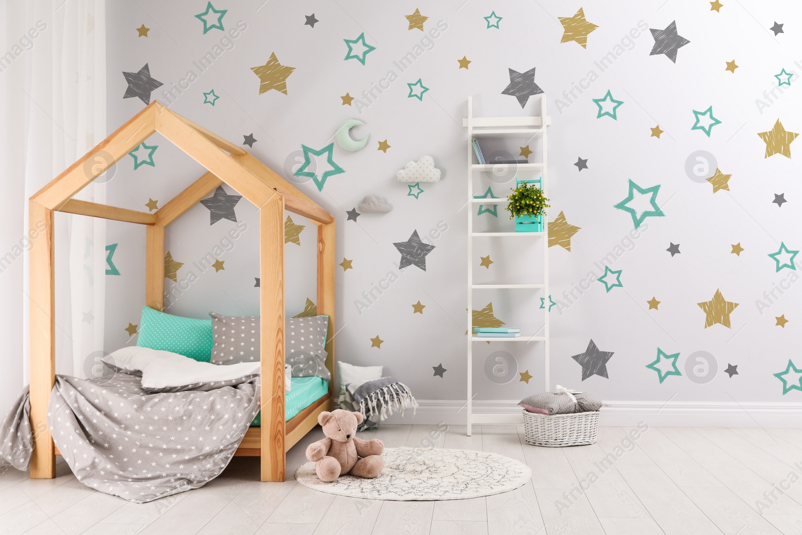 Image of Stylish child room interior with comfortable bed