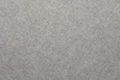 Photo of Texture of grey fabric as background, top view