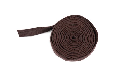 Photo of Brown karate belt isolated on white. Martial arts uniform