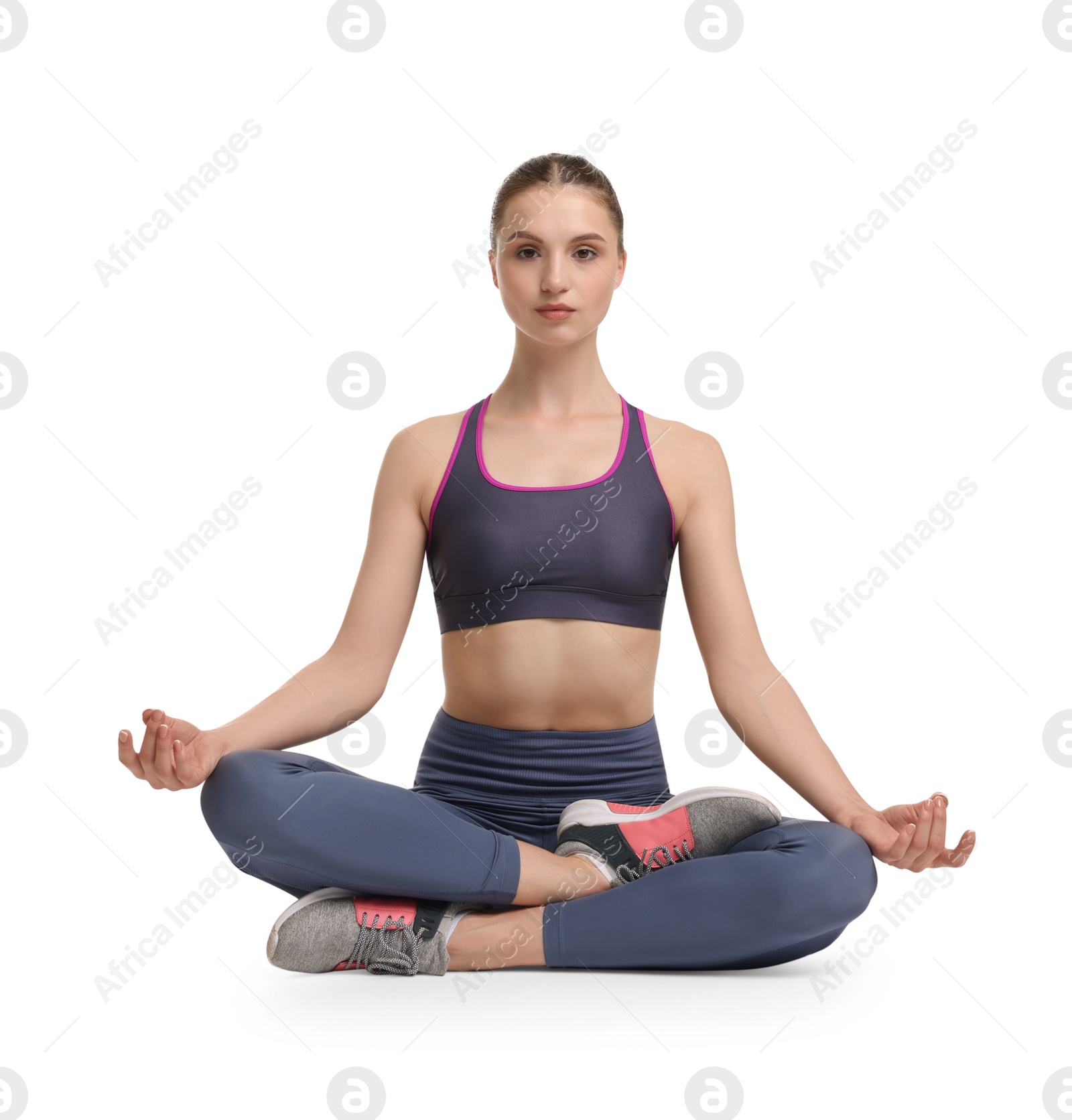 Photo of Young woman practicing yoga on white background