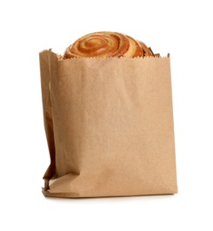 Paper bag with bun on white background. Space for design