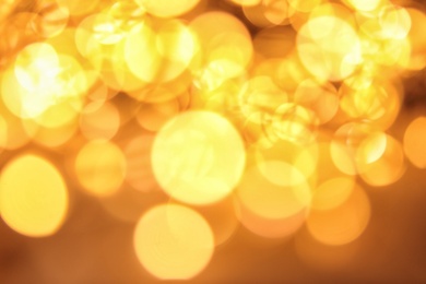 Gold glitter with bokeh effect as background