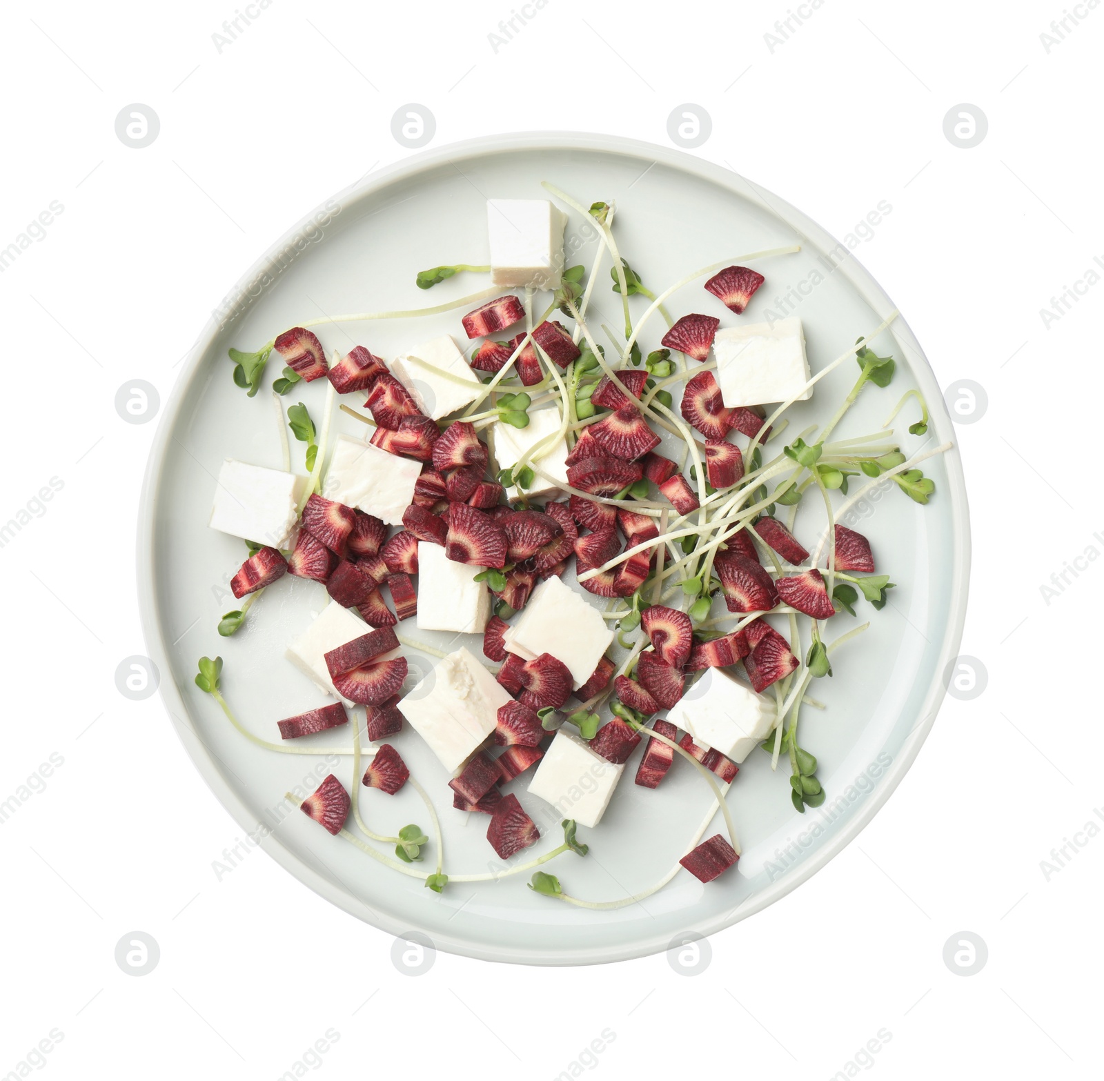 Photo of Delicious fresh carrot salad with feta cheese isolated on white, top view