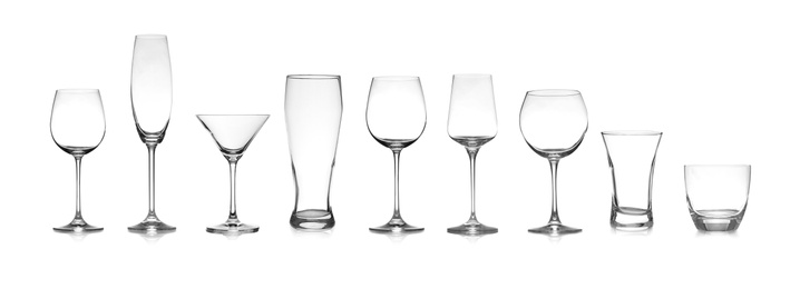 Image of Set of different empty glasses on white background. Banner design