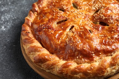 Tasty homemade pie on grey table, closeup