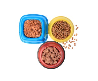 Photo of Dry and wet pet food in feeding bowls isolated on white, top view