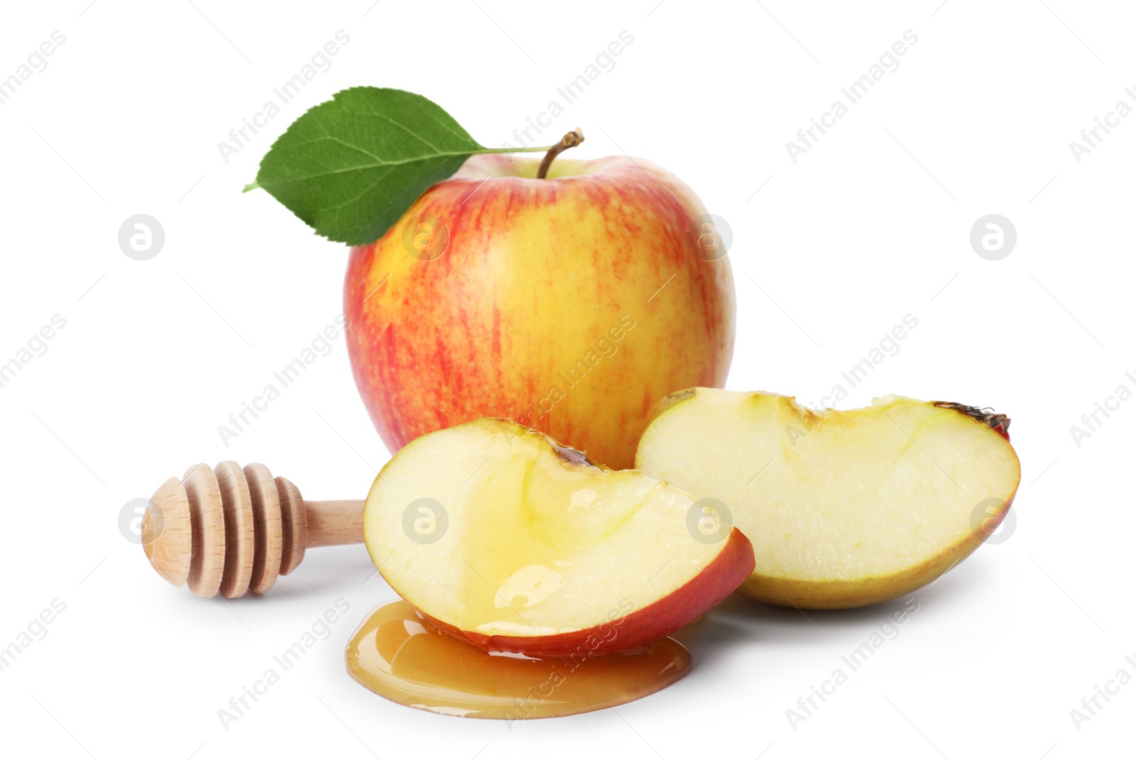 Photo of Apples, honey and dipper on white background