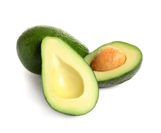 Ripe fresh avocados on white background