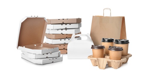 Set with different cardboard boxes for pizza, paper bag and takeaway cups on white background