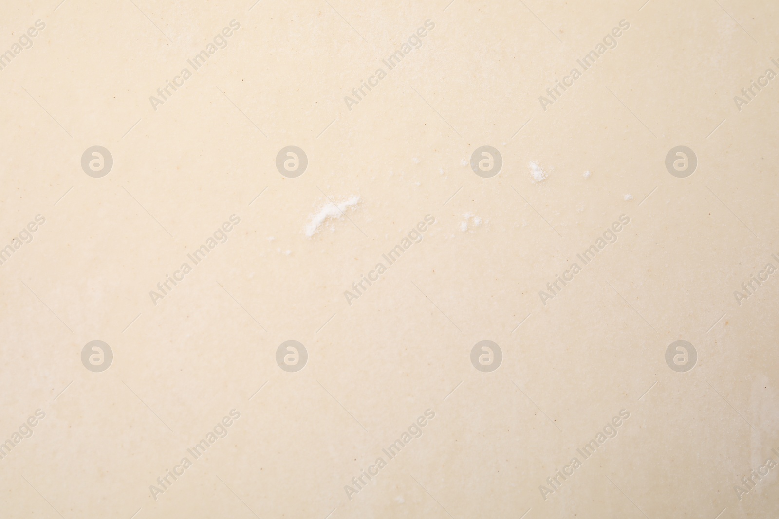 Photo of Raw puff pastry dough as background, top view