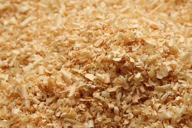 Dry natural sawdust as background, closeup view