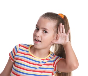 Photo of Cute little girl with hearing problem on white background