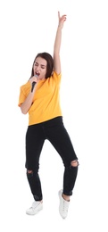 Photo of Young woman wearing casual clothes singing in microphone on white background